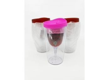 (B-14) LOT OF 4 (ONE IS NOT PICTURED) PLASTIC TRAVEL WINE GLASSES
