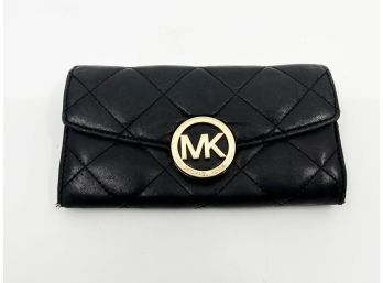 (D-24) MICHAEL KORS QUILTED BLACK LEATHER WALLET - 8'