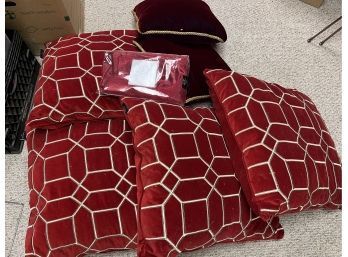 (B) FOUR OVERSIZED RED 'TAHARI' PILLOWS, NEW 70' BY 144' METALLIC RED TABLECLOTH & TWO BURGUNDY & GOLD PILLOWS