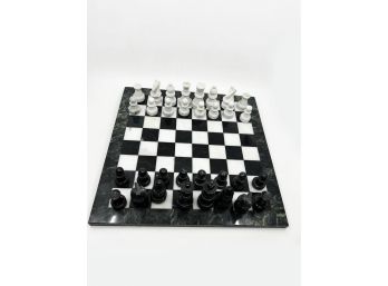 (A-109) VINTAGE MARBLE CHESS SET - 14' BY 14' MARBLE BOARD & 32 PIECES