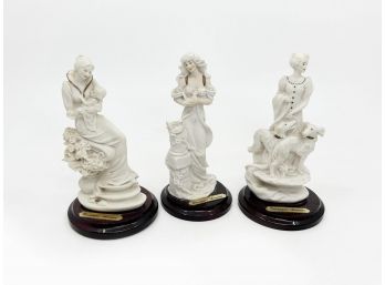 (A-8) LOT OF THREE 'GIUSEPPE ARMANI FIGURINES - GINORI ON WOOD STANDS - WOMAN WITH DOGS, BABY & BIRD - 5'