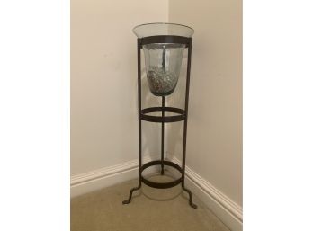 (U-9) GLASS FLOOR VASE ON BLACK IRON STAND - 30' HIGH BY 10' WIDE