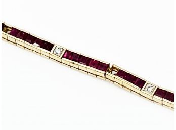 (G-12) 14 KT GOLD AND RUBY ? GARNET? W/ DIAMOND BRACELET-3 MISSING STONES-5.09 DWT - APPROX. 7 1/2 INCHES LONG