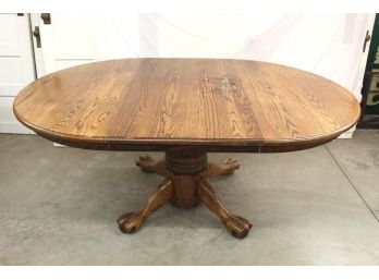 48' Round Oak Table With 24' Leaf, Turned Center Pedestal And Claw Feet  (104