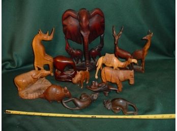 13 Carved Wooden Figurines  (49)