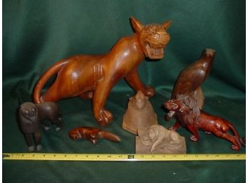 7 Wooden Carved Figurines  (47)