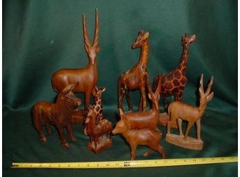 9 Wooden Carved Figurines  (46)