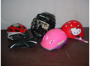 2 Youth Bike Helmets; Bauer Catcher's Mitt; Bike Helmet & Seat