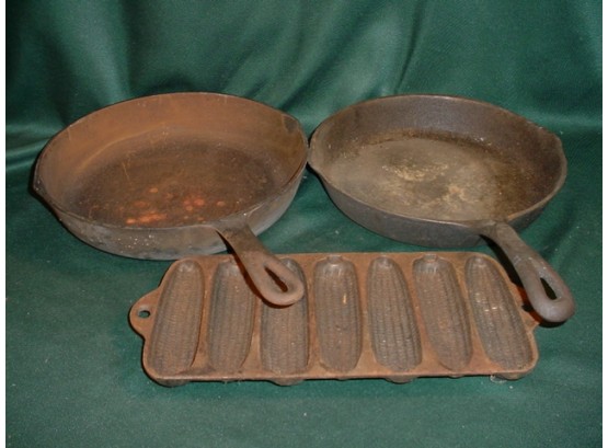 Two 10.5' Cast Iron Skillets & Cast Iron Corn Pan   (196)