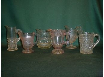 6 Early Small Pattern Glass Pitchers (two Are Sun Truned Purple)    (54)