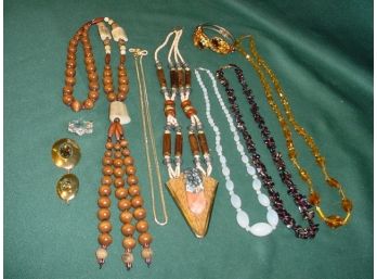 5 Necklaces, Eyeglass Strap, Bracelet,  & Pendants    (202)