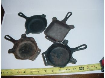 4 Iron Ashtrays - 3 Griswold & 1 Wagner  (62)