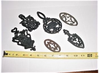 6 Miniature Iron Trivets  (56)