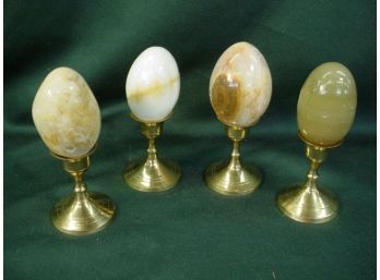 4 Polished Stone Eggs & Brass Candlestick Stands  (129)