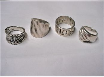 4 Silver Rings, 41.7 Grams  (260)