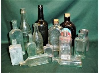 14 Assorted Embossed  Glass Bottles  (90)