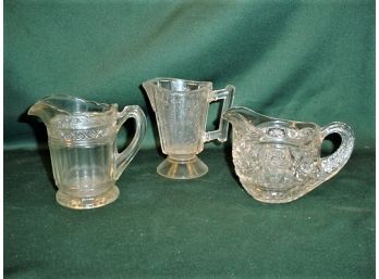 Group Of 3 Antique Clear Pressed Glass Pitchers, 5', 5', 4'H   (54)