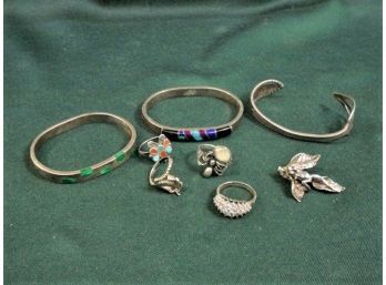 Sterling Lot: 3 Bracelets, 4 Rings,& Pin - 3.55Troy Ozs.    (120)