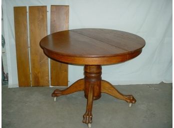 Antique American 42' Round Oak Table With 3 Leaves - 2@ 9', 1@ 6.5'    (115)