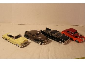 4  Model Toy Cars, Metal & Plastic- 1953 Chevy, 1947 Chevy (Jada), 1958 Cadilac, 1939 Chevy (Jada)     (21)