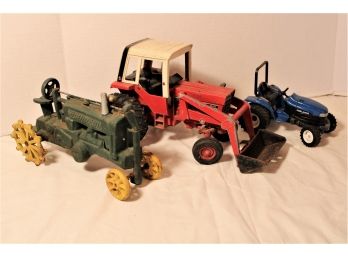 Group Of 3  Model Toy Tractors: Cast Iron, International #1586, New Holland TC33   (14)