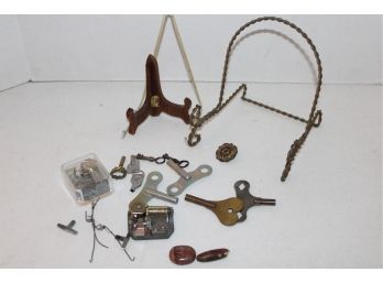 Assorted Clock Keys, Music Box Motors & Parts, 3 Antique Cabinet Keys, Plate Stands, More   (388)