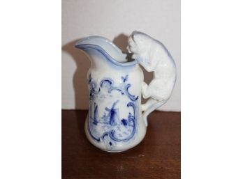 Unmarked Transferware Porcelain Creamer With Cat Figure Handle  (420)