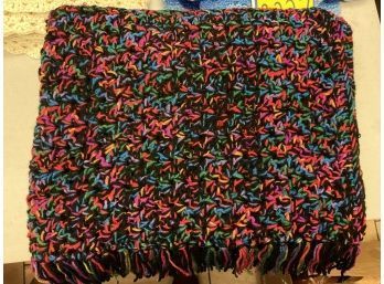 Multi Color With A Black Base Lap Afghan