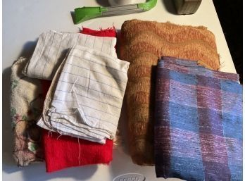 Lot Of Material And Towels.