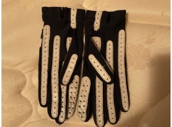 Pair Of Black And White Gloves