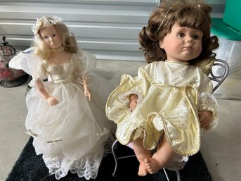 Lot Of 2 Dolls With Chair