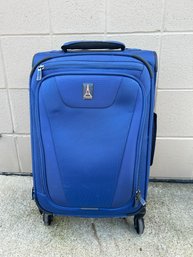 Blue Travelpro Suitcase