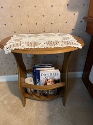 Side Table With Daniel Steele Books And Doiley