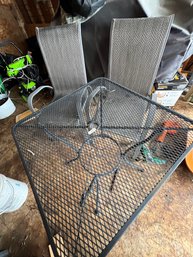 Two Chairs And Metal Outdoor Patio Table