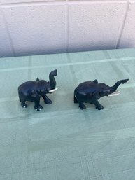 Vintage Carved Black Trunk Up Elephants