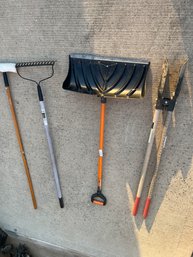 Four Piece Lawn Care Tool Lot - Rake, Snow Shovel, Post Hole Digger & More