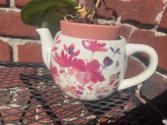 Teapot Planter With Purple Orchid