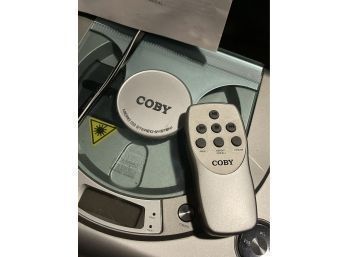 COBY Micro CD Stereo System With AM/FM Tuner CX-CD387