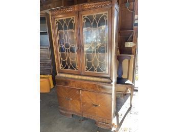 Art Deco Two Door China Cabinet With Carved Wood Accents