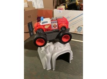 Toy Blaze Trunk And Plastic Rock