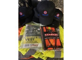 Lot Of 5 Safety Vests And Eight 76 Lubricant Hats