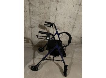 Drive Royal Blue Walking Assistant With Brakes And Carry Pad That Doubles As Seat Rest