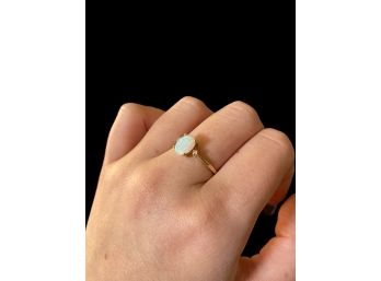Opal With Single Diamond On Each Side