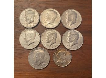 Seven Half Dollars And 1 Susan B Anthony Dollar Coins