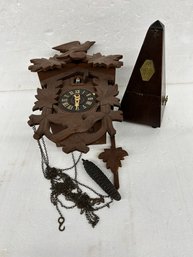 German Cuckoo Clock And A Metronome