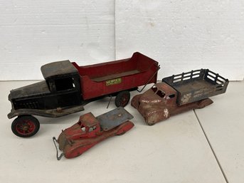 Three Toy Trucks Including One Buddy L - As-is
