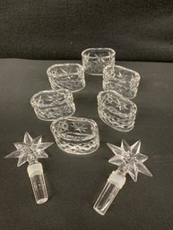 Set Of Six Waterford Napkin Rings And Two Star Stoppers