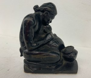 Small Iron Sculpture Of Native American Potter