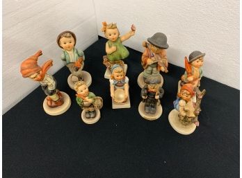 9 Hummel Figurines