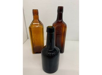 3 Early Embossed Bottles.     One Has Crack